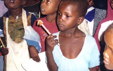 FKC children fascinated by pencil gifts